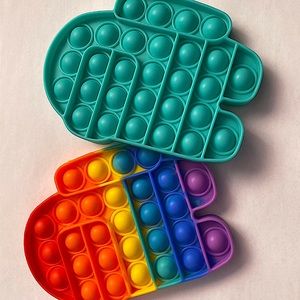 2 pieces (pop it) among us one rainbow and one teal